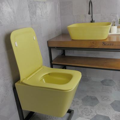 China Reservoir Bathroom Italian Matt Yellow Luxury Ceramic Toilets Chaozhou Modern Factory Wall Hung Toilet Hidden Suite for sale