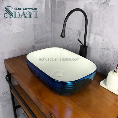 China EUROPEAN SDAYI Sanitary Ware Luxury Color Countertop Wash Hand Basin Blue Plated Ceramic Art Sink For Bathroom for sale