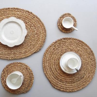 China Custom Woven Mat Heat Insulation Round Straw Braided Kitchen Dining Table Place Mat Viable Wholesale for sale