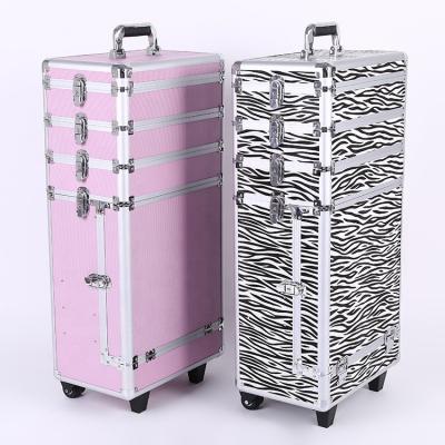 China Large Capacity Fashion 4 IN 1 ZEBRA PINK Aluminum Trolley Makeup Cosmetic Case With 2 Wheels And Firm Stand For Artist for sale