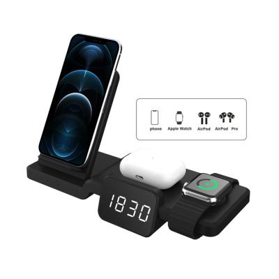 China Wireless Charger With LED Time Display New Arrival 15w 4 In 1 Fast Wireless Charger Charging Station 4 In 1 Qi Wireless Charger Stand For Iphone Samsung for sale