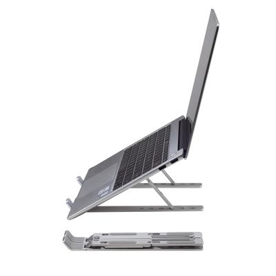 China Adjustable (Height) Aluminum Ergonomic Foldable Portable Laptop Stand 6 Angles Portable Desk Stand for sale