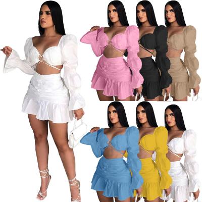 China New Arrivals ALS267 Women Breathable Apparel Sexy Club V-Neckline Low Cut Long Sleeve Crop Top Pleated Hollow Out Hip Skirt Two Piece Sets for sale