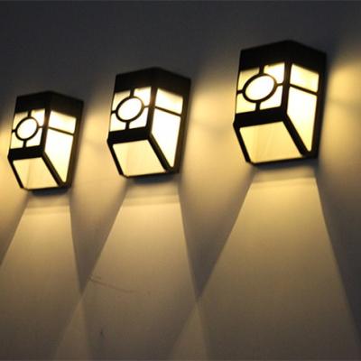 China Hot Selling Solar Powered Garden Plastic Outdoor Garden Led Wall Light for sale