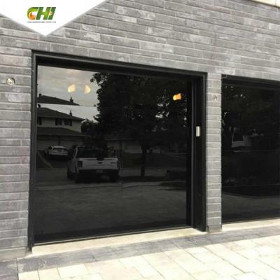 China Waterproof Commercial Modern Black Glass See Through Garage Doors 16' Mirror Aluminum Full Vision Glass Sectional Garage Door for sale