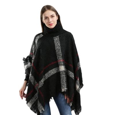 China Acrylic Women's Sweaters Wraps Knit Winter Warm Plaid Poncho Sweater With High Collar Batwing Tassels for sale