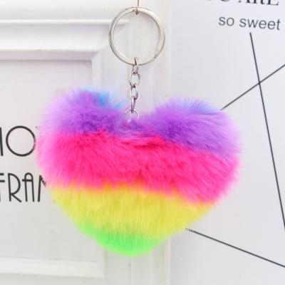 China Rainbow Color Heart Shaped Pom Poms Keychains Heart Shaped Eco-friendly Fluffy Car Bag Charm For Women Girls for sale