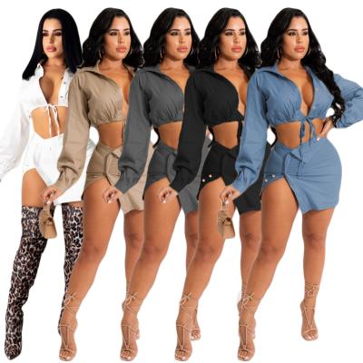 China Newest Design Sustainable Crop Top Irregular Bandage Long Sleeve Drop Long Mini Skirt 2 Piece Set Women Solid Color Shirt Skirt Two Piece Set for sale