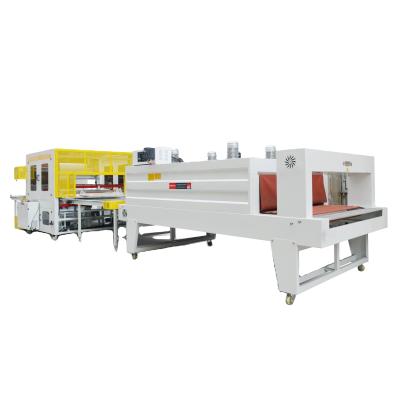 China High Speed ​​Automatic Commodity Shrink Wrap Machine Shrink Wrap Machine Shrink Film Machine Vending Machine Package Line zu verkaufen