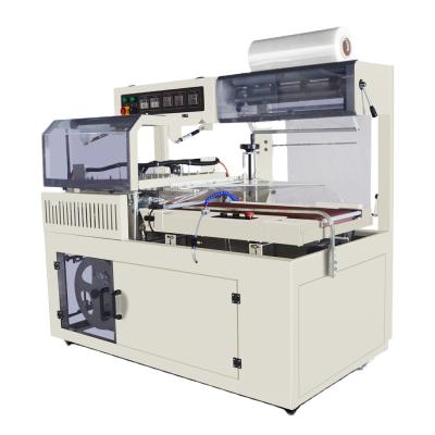 Κίνα Food 1 Year Warranty 2 In 1 Shrink Packaging Machine Shrink Film Sleeve Wrapping Machine προς πώληση