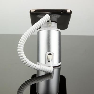 China COMER Retail Shop counter Display Magnetic Mobile Phone Holder With Alarm And Charging for sale