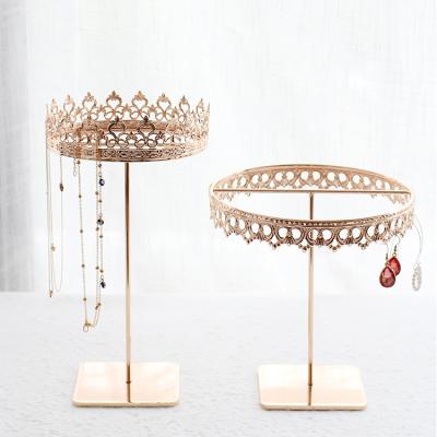 China Vertical European Retro Princess Crown Earring Display Metal Jewelry Necklace Handmade Model Rotating Display Stands for sale