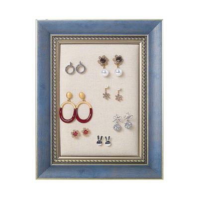 China Artificial Wall Mounted Plate Shaped Earring Rack Table Frame Earring Display Rack Maids Jewelry for sale