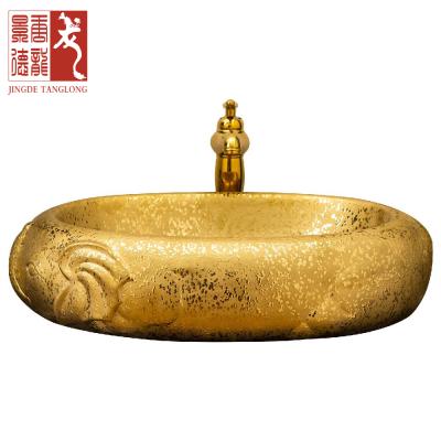 China New Design Durable Luxury Gold Elephant Countertop Ceramic Wash Basin Bathroom Sink Porcelain Hand Wash Sink Basin for sale