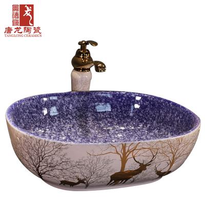 China 2020 Modern Design Elks Pattern Durable Sapphire Blue Hand Painted Ceramic Bathroom Sink for sale