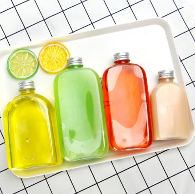 China food & Beverage packaging factory direct sale small PET juice bottle flat square oblique shoulder wine bottle 300ml for sale