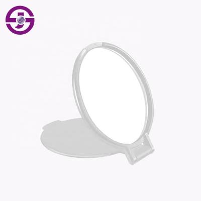 China New Hot Selling Enlargement Female Girls Daily Use Mini Mirror Folding Around Portable Travel Makeup Mirror for sale