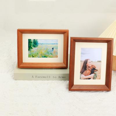 China Custom Height Desk Frame 12 Inch 8k Wash Photo Frame Wall Hanging Decoration Environment Friendly Solid Wood Wood Frame for sale