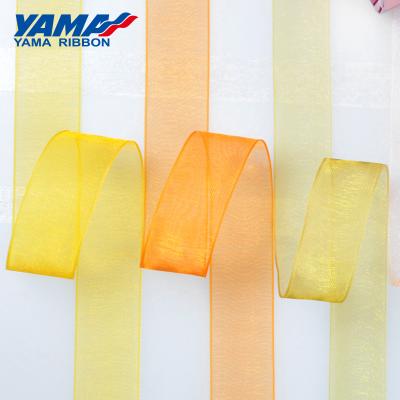 China Double face YAMA factory stocked 3-75mm pure solid color organza yellow orange ribbon for sale