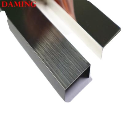 China Modern DAMING Brushed Treatment Tile Accessories Tiles Edge Trim Stainless Steel for sale