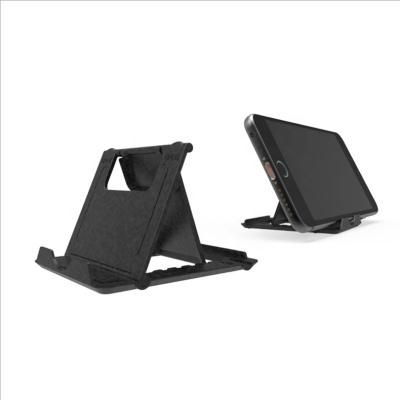 China Large Size Universal Desktop Stand Holder Phone Tablets Plastic Smartphone Holder Folding Tablet Stand for sale