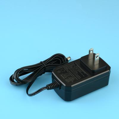 China LED Table Lamp Switching AC DC Power Adapter US Plug Wall Mount 5V- 24V 0.5A- 4A for sale