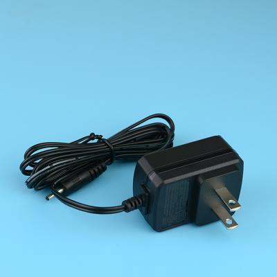 China Adaptador de comutação personalizado 9V 10V 11V 11.5V 850mA 1100mA 1.2A 1.3A da alimentação de DC da C.A. à venda