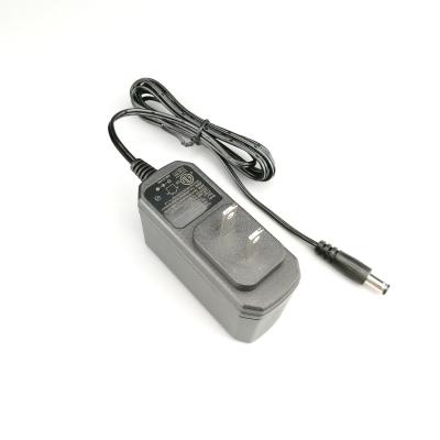 Chine Téléphonez le chargeur commutant le type de la caméra TV des USA 3V 6V 7V 9V 12V 1A 1.5A 2A d'adaptateur d'alimentation CC À C.A. à vendre