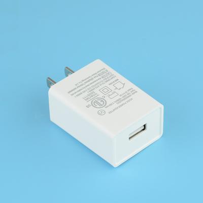 China Carregador liso 5V 1A 1.2A 1.5A 2A 2.1A 2.4A 2.5A do curso do telefone celular do adaptador de modo do interruptor da C.A. da parede de USB da tomada dos E.U. à venda