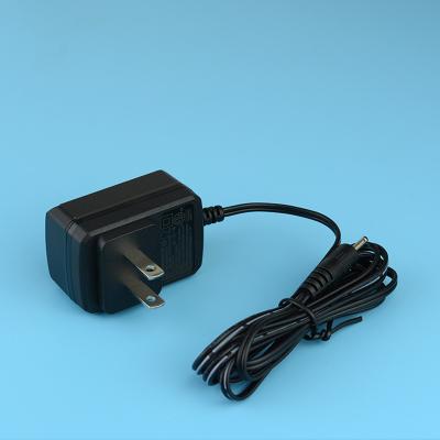 China 10 watts que comutam o adaptador 5V 9V 12V 1A 1300mA 2A da alimentação de DC da C.A. com 1-3 anos de garantia à venda