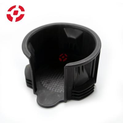 China Black Rubber Cup Holder Insert For Land Rover LR087454 Car Water Cup Holder Insert Car Drink Bottle Holder for sale