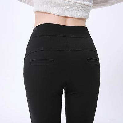 China Antibacterial Women's Winter Silk Lined Leggings With High-waisted Warm Yoga Pants With Pockets for sale