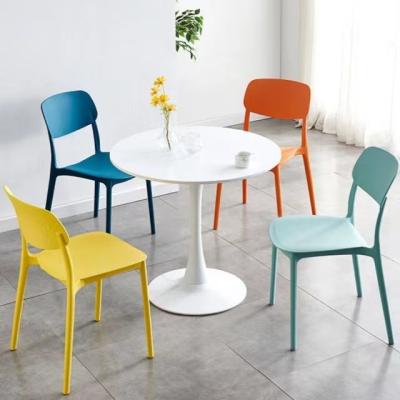 China Save Space Nordic Modern Simple Plastic Dining Chair Cheap Home Chair PP Strong Plastic Dining Chairs for sale