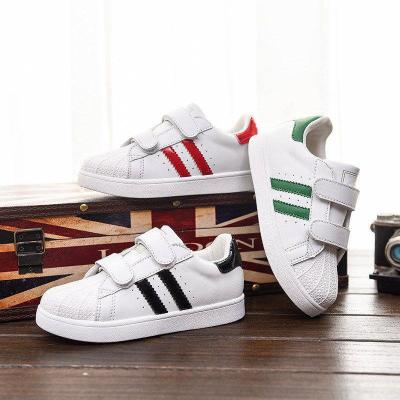 China Other Classic Style Children's Sports Shoes Non-slip Whiteboard Shoes for sale