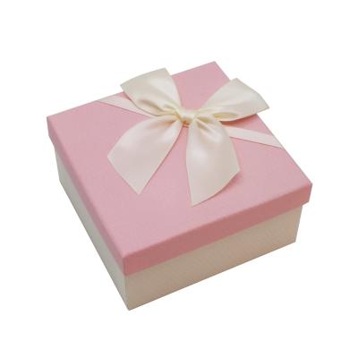 China Luxury Cardboard Handmade Packaging Glossy Souvenir And Gold Gift Paper Top And Low Pink Cardboard Box for sale