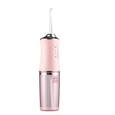 China Portable Oral Irrigator Household Device Household Tooth Sprayer Electric Tooth Rinse Remover With A Spout for sale