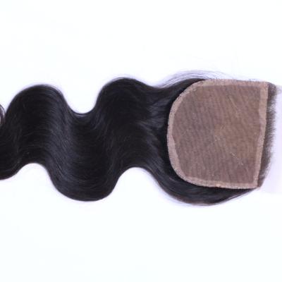 China Body Wave Natura Hairline Closure Silk Low Virgin Hair Brazilian Body Wave Hair Extension With Closure for sale