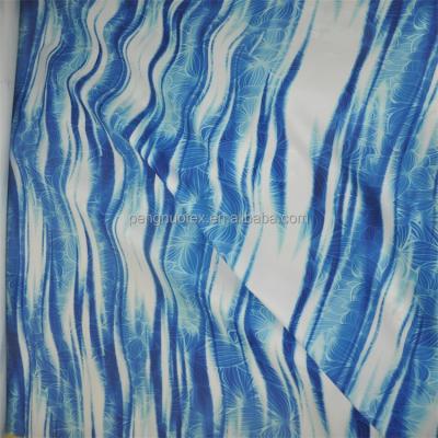 China Micro Twill Peach Fabric With Tropical Print Fabric For Board Shorts Fabric for sale