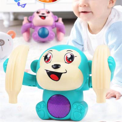 China HOT Selling Plastic Monkey Light Music Puzzle Voice Control Cartoon Kids Early Educational Toys Rolling Rolling Infant Gift for sale