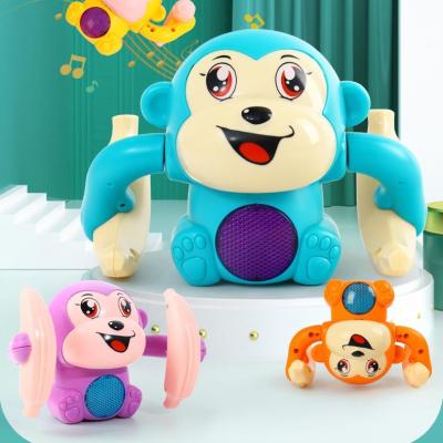 China Wholesale Plastic Little Rolling Monkey Toys Children Toys Gifts Electric Voice-activated Music Toys for sale