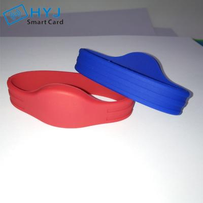 China Soft And Comfortable Fabric To Use Waterproof Silicone RFID Wristbands Hotel Key Wristbands For Access Control for sale