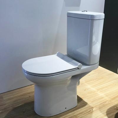 China Double-flow Huida factory supply bathroom p-trap two-piece washdown ceramic closestool toilet for sale