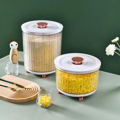 China Viable BPA Free Cereal Storage 5KG 10KG Rice Dispenser Container With Measuring Cup for sale