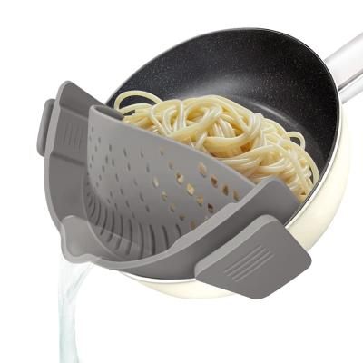 China Hands Free Silicone Food Sustainable Clip On Pan Strainer For Kitchen Food Spaghetti Pasta for sale