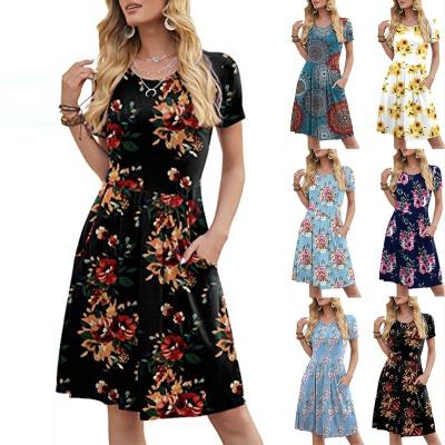 China 2022 spring summer round neck floral dress pattern anti-static short sleeve flowers dress with pocket women casual dress for sale