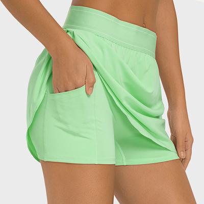 China Women's Athletic Golf Tennis Skorts Skirts with Pockets Built-in Shorts zu verkaufen