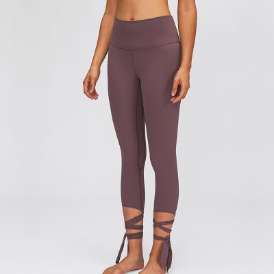 China La yoga de la cintura alta de las mujeres de nylon de la favorable piel jadea la ropa del entrenamiento del control de barriga en venta