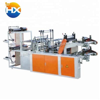 China Fully Automatic High Speed ​​Rolling Flat Manufacturing Double Layer Bag Making Machine for sale