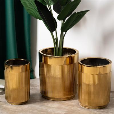 China Factory home hotel gold luxury floor outdoor decoration plant pot cylinder tall ceramic large big flower pots for plants for sale