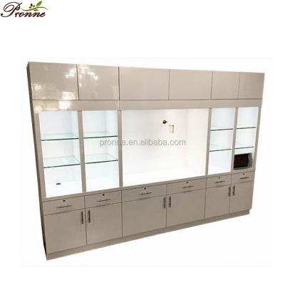 China Simple And Modern Nail Salon Furniture Beauty Spa Glass Display Case With Storage for sale